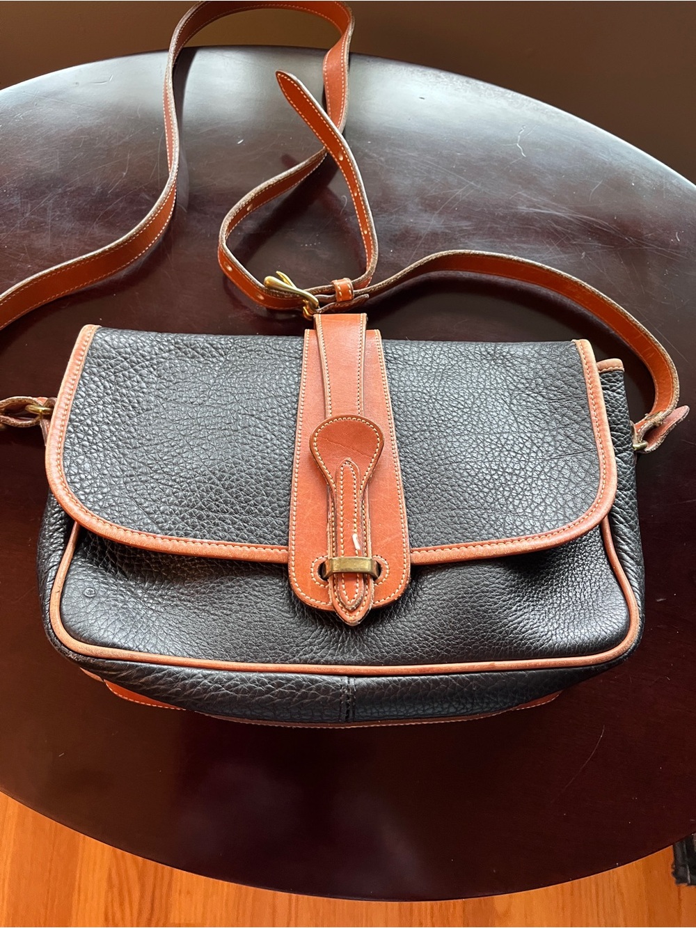 Dooney & Bourke Black Leather Crossbody with Brown Trim